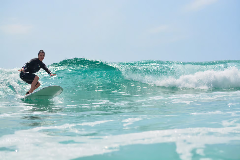 A private surfing lesson on Cerritos Beach, Mexico.