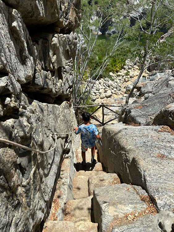 A steep descent down rocky steps at Canon de la Zorra (Fox Canyon) Baja California Sur, Mexico.