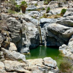 A viewpoint looking down on the Sol de Mayo waterfall at Canon de la Zorra (Fox Canyon) Baja California Sur, Mexico.