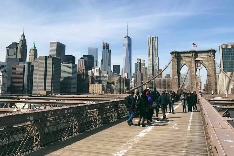 The Brooklyn Bridge on a walking tour in New York City, USA.