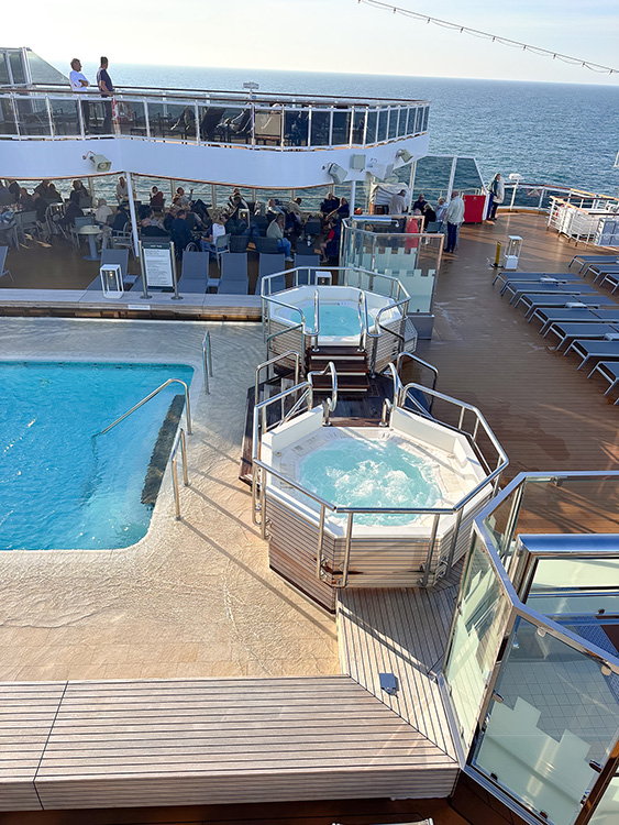 The adults-only pool and two spa pools on board the Holland America Line MS Rotterdam.