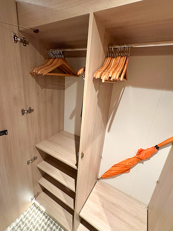 Plenty of storage space and clothes hangers in a Verandah Stateroom on board the Holland America Line MS Rotterdam.