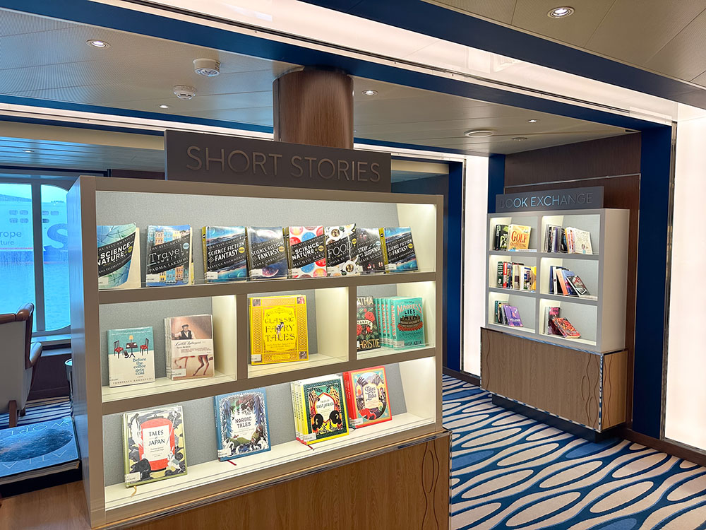 A selection of book displays in the library on board the Holland America Line MS Rotterdam.
