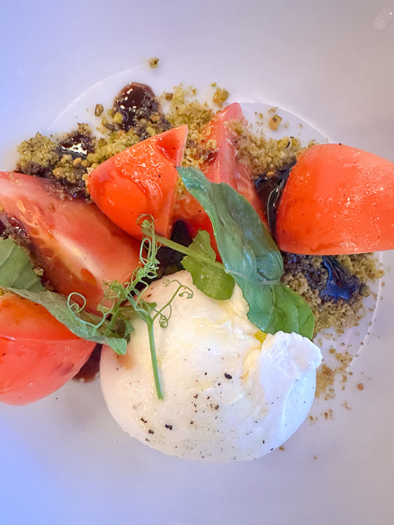Caprese salad of mozzarella, tomatoes and basil with a balsamic dressing, served at Canaletto on board the MS Rotterdam.