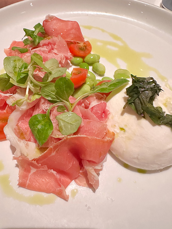 Mozzarella, tomato and Parma Ham appetizer served at Rudi's Sel de Mer on board the MS Rotterdam.
