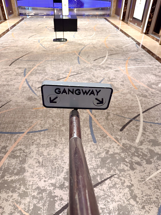 Signs for disembarkation on the MS Rotterdam, a Holland America Line cruise ship.