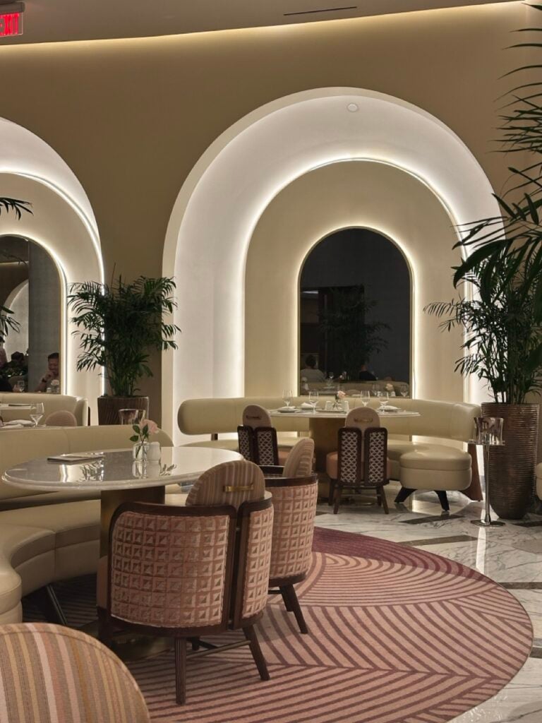 Curved lines and pastel colors at La Fontaine restaurant in the Fontainebleau Las Vegas hotel.