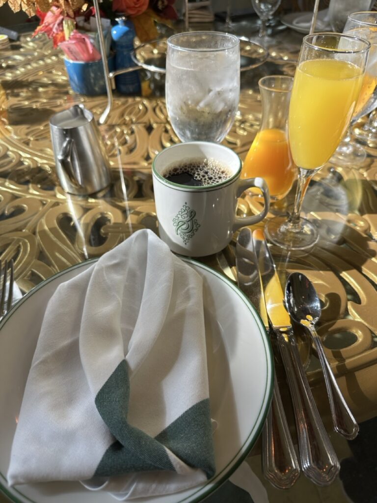 Brunch table setting with ice water, coffee and a mimosa at the Garden Table at the Bellagio, Las Vegas.