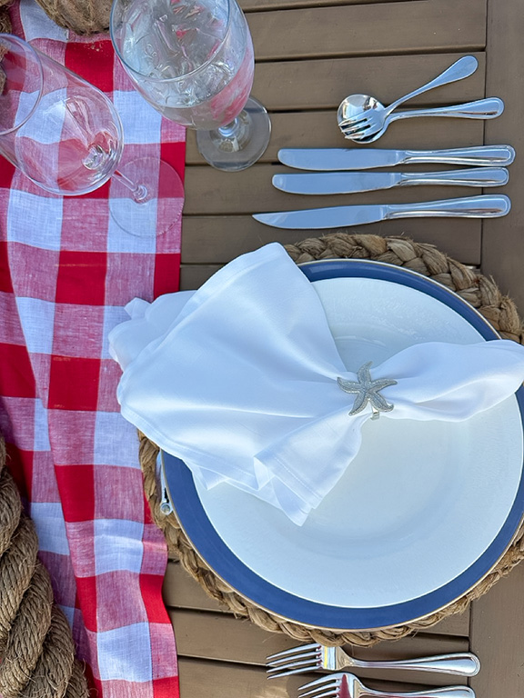 Table setting for a clambake dinner at the Chatham Bars Inn Resort & Spa, Cape Cod, MA.
