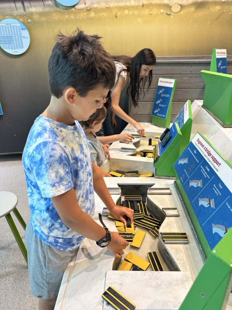 A fun bridge building activity at the Boston Museum of Science in Boston, Massachusetts.