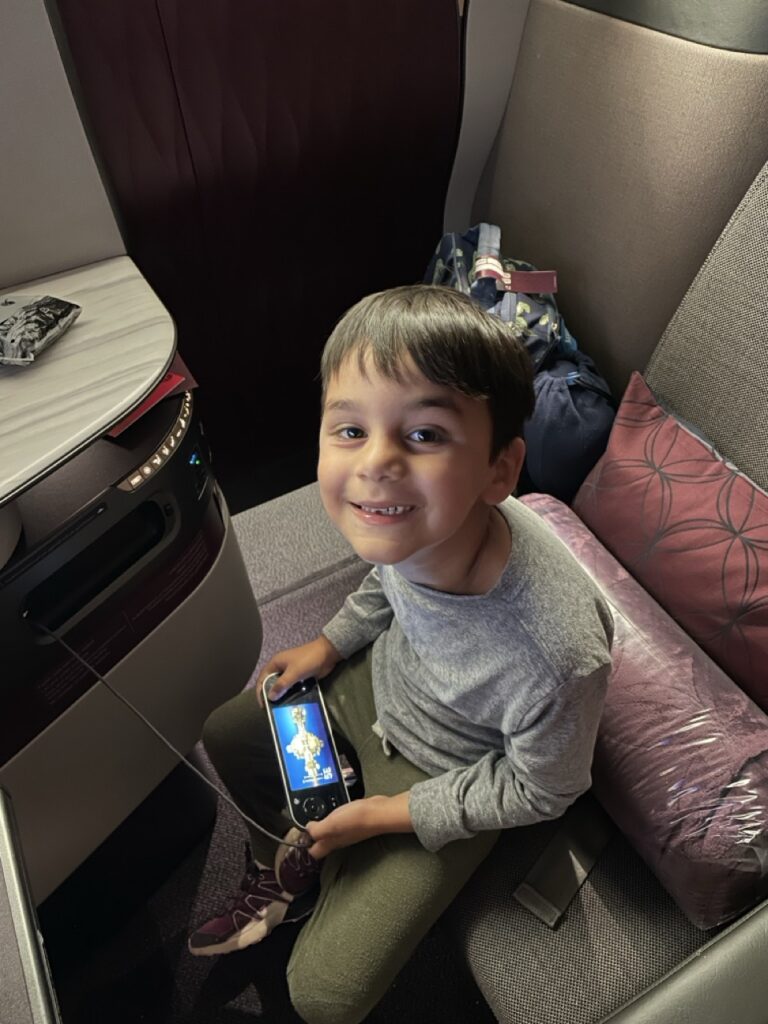 One of Ashley Wali's sons in the Business Class Q-Suite on board a Qatar Airways flight.