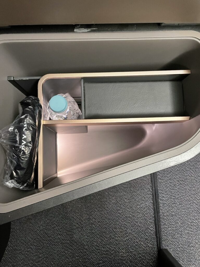 Plenty of storage in the Business Class Q-Suite on board a Qatar Airways flight.