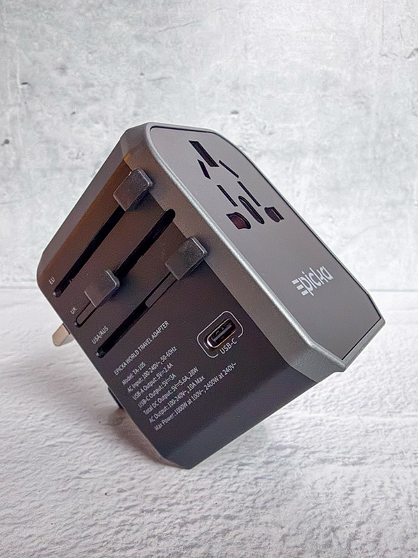 Side view of the EPICKA Universal Travel Adapter, showing how the correct plug adaptor is selected.