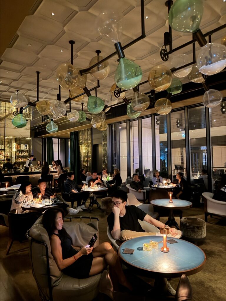 The interior decor at DarkSide cocktail bar, Hong Kong, with dramatic glass lighting.