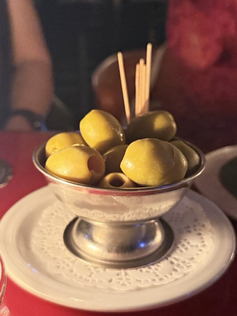A bowl of signature smoked olives at Bar Montana, Hong Kong.
