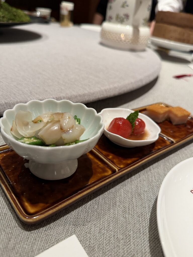 Lily bulb with okra, tomato with dried salted plum, and crispy pork belly on the gluten-free tasting menu at Duddell's restaurant, Hong Kong.
