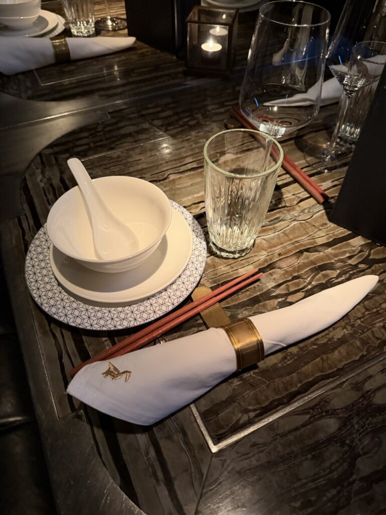 Table setting at Mott 32 restaurant, Hong Kong.