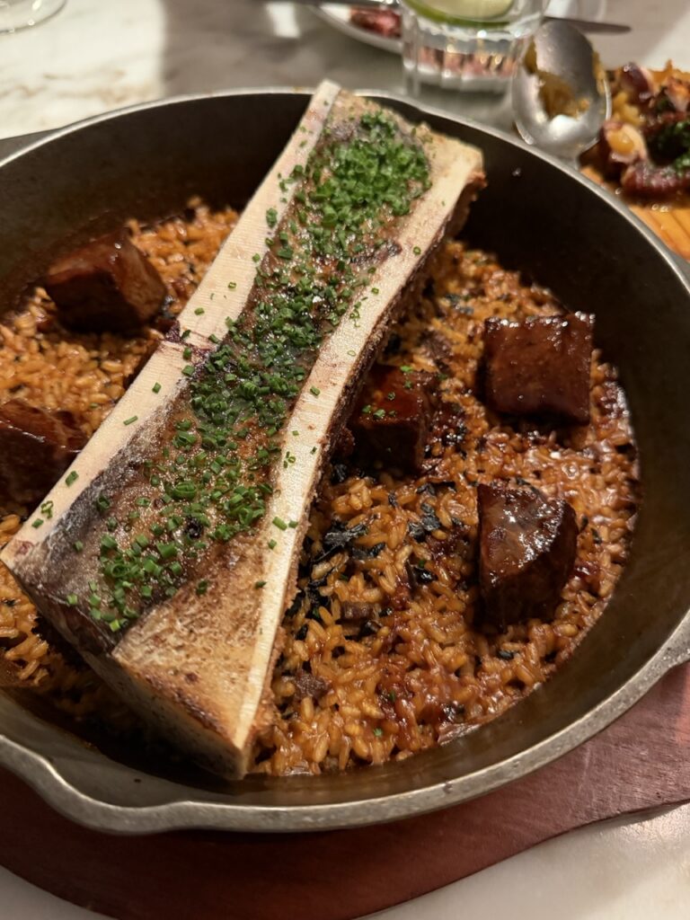 A rice dish topped with bone marrow at Bayfare Social restaurant, Hong Kong.
