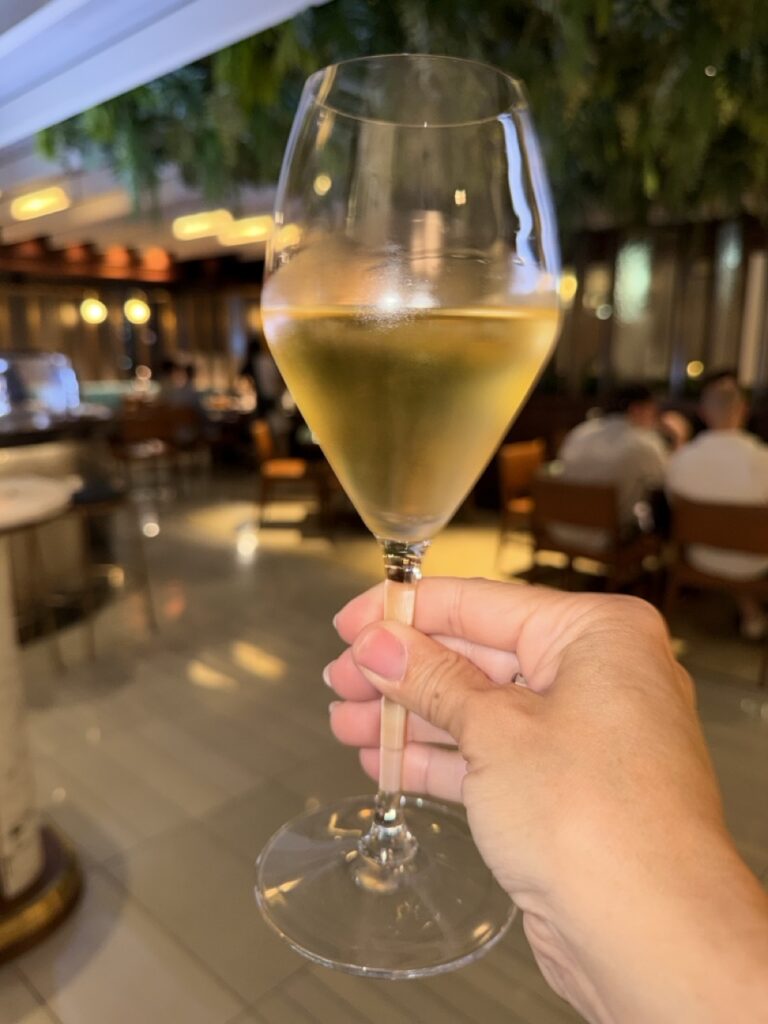 A glass of wine at Bayfare Social restaurant, Hong Kong.