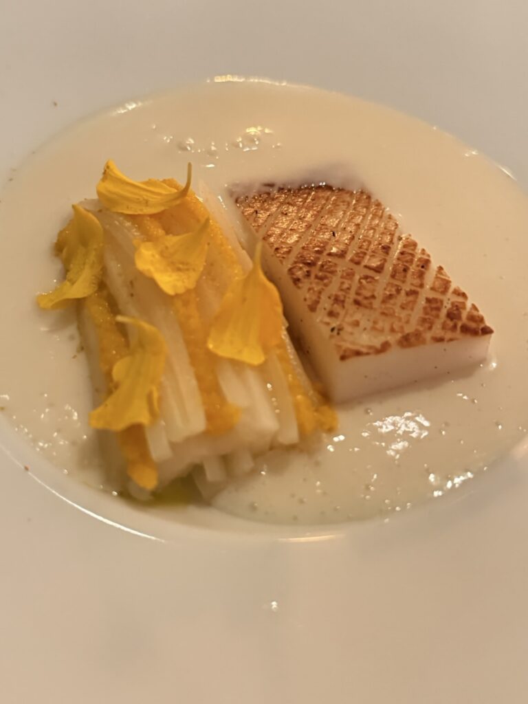 Fish served with white asparagus at the Louise restaurant, Hong Kong.