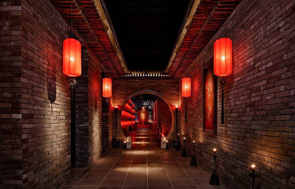 The dramatic brick walled entrance at Hu Tong restaurant, Hong Kong.